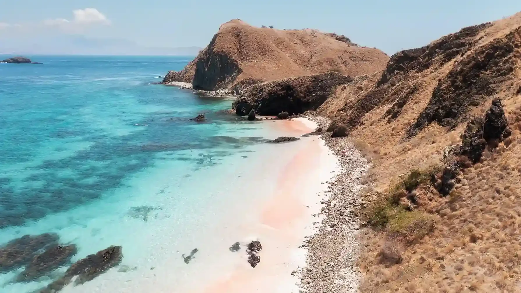 The pink sand at Pink Beach